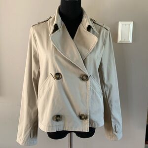 Women’s cropped trench (L) tan, no stains, has been laundered.